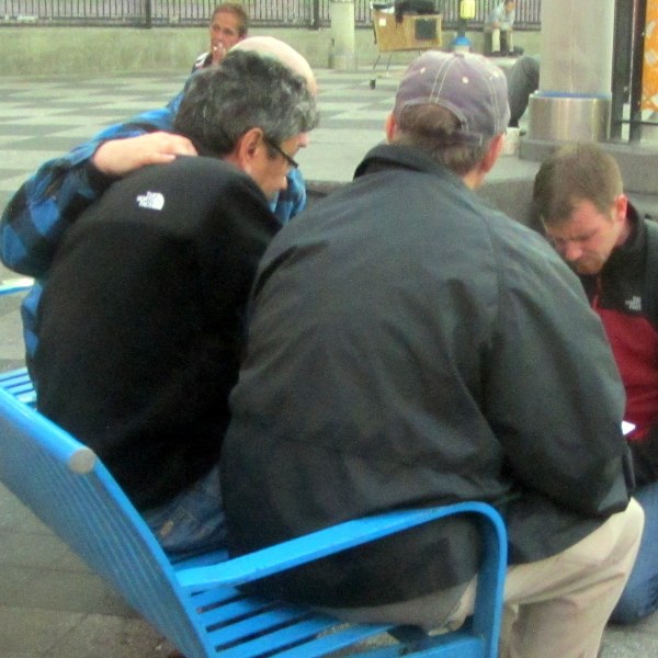  Praying with man at 16th St. and Mission.